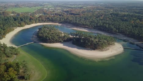 Aerial-drone-view-of-the-beautiful-recreational-lake-of-the-Henschotermeer-in-the-Netherlands,-Europe