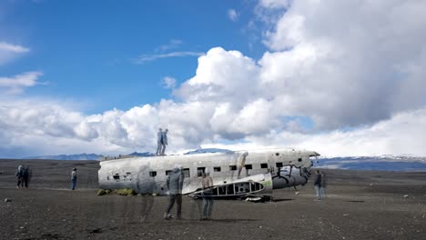 4k timelapse of plane wreck on black sand beach in iceland.
