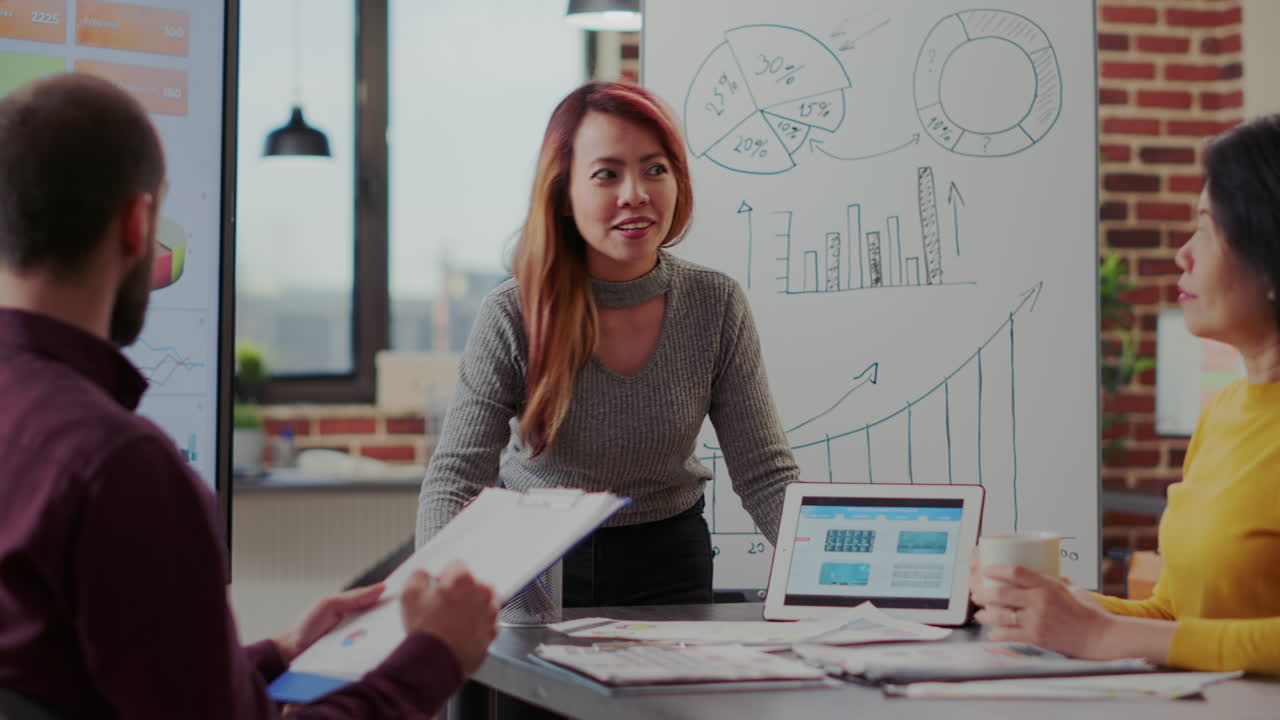 Diverse team of people meeting to discuss business growth