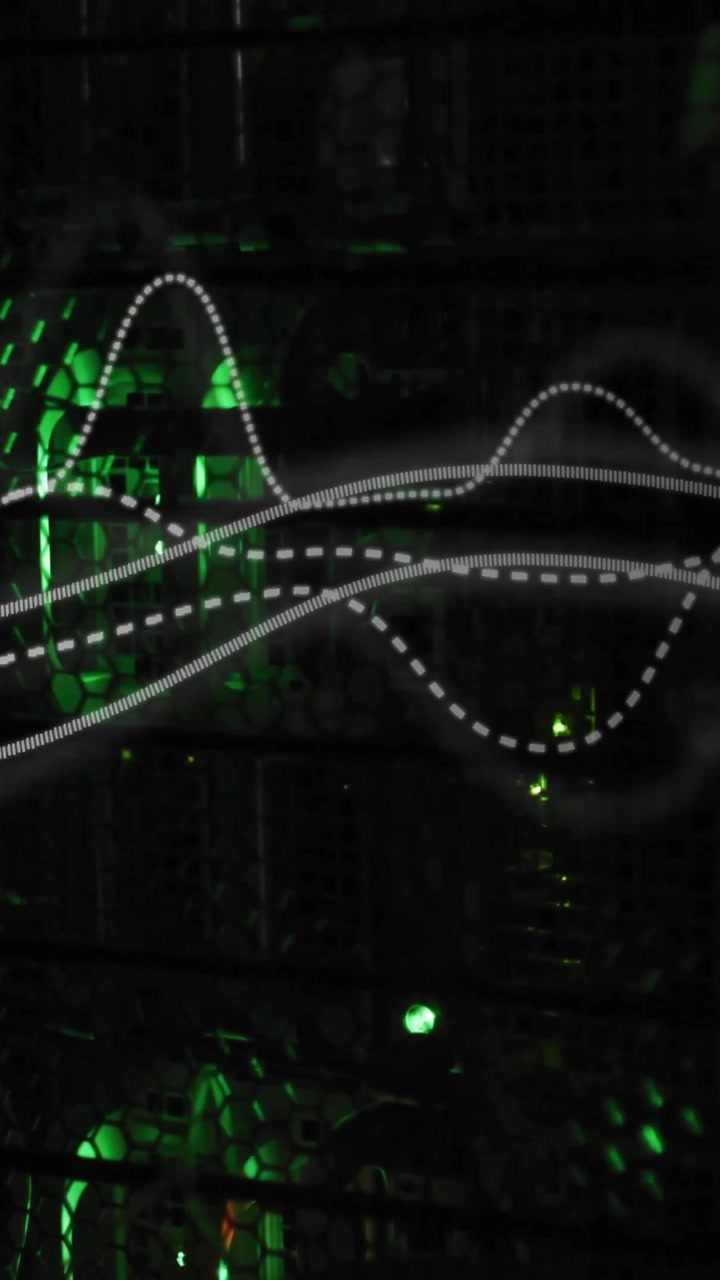 Waveform animation over green-lit server racks in data center