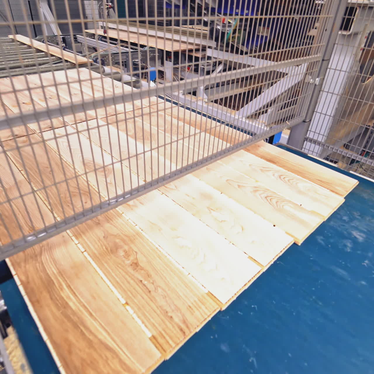 Modern Production of parquet board. Industrial production line.