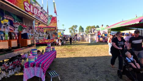 families enjoying a vibrant fairground in coonabarabran