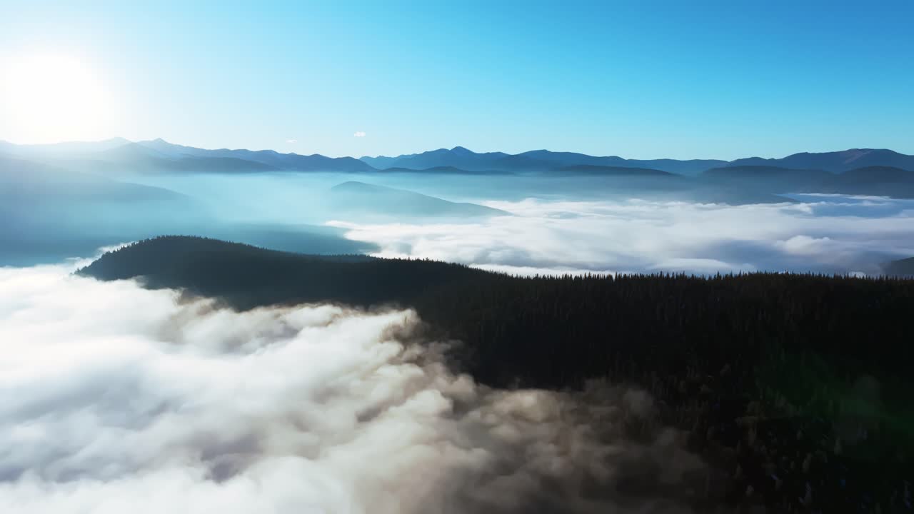 Juniper Pass Warrior Mountain Colorado showing vast misty valleys and cloud-covered peaks, ascend reveal