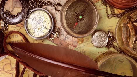 vintage style travel and adventure. vintage old compass and other vintage items on the table.