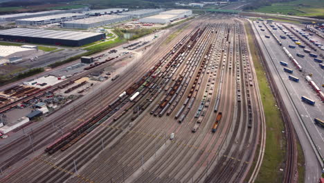 aerial view of a busy train yard and logistics hub