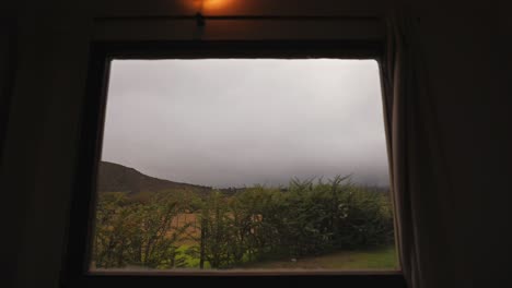 rural landscape of tafí del valle seen from room window, tucumán, argentina