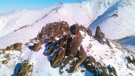 Drone-distance-from-winter-mountains-and-rocks-4k