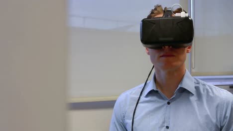 Man using oculus rift in college