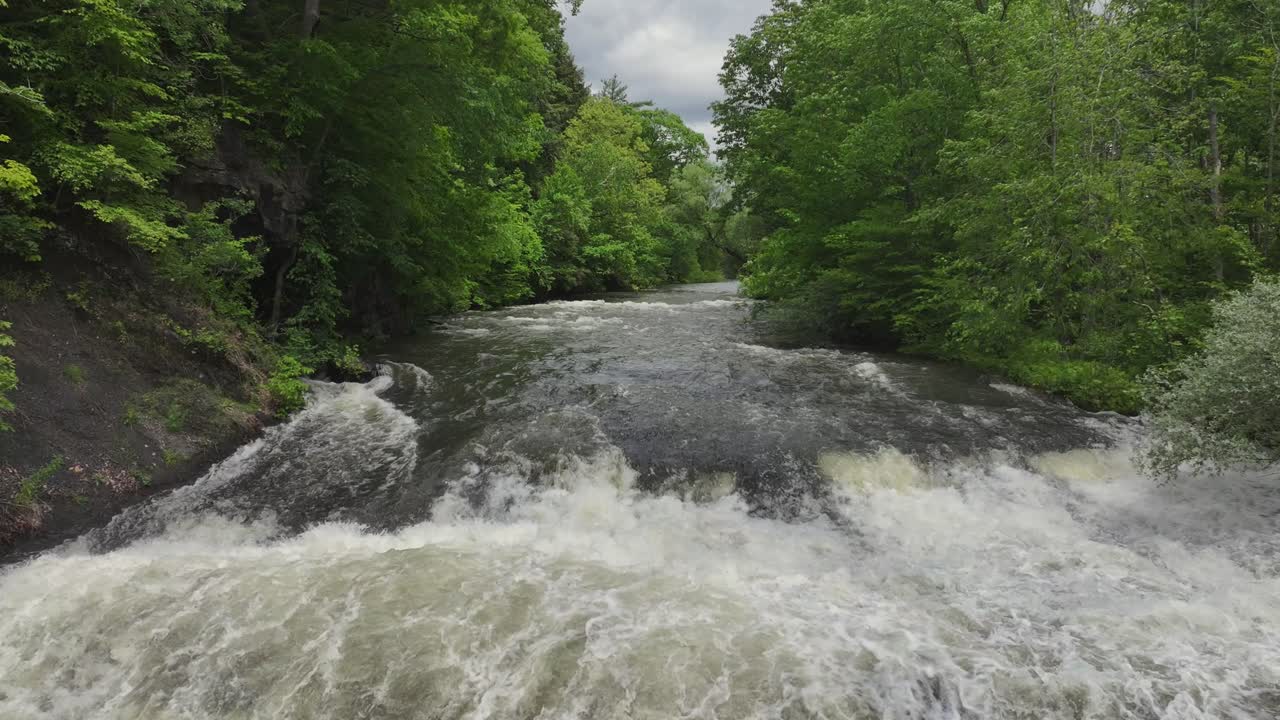 Droning upriver near Buttermilk Falls in New York