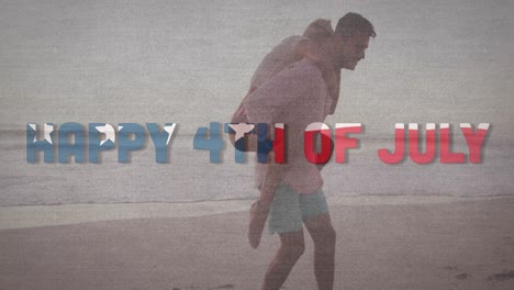 Independence-day-text-against-caucasian-man-giving-his-wife-a-piggy-back-ride-at-the-beach