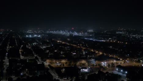 Fireworks-Exploding-in-the-Distance-in-Urban-City-Center