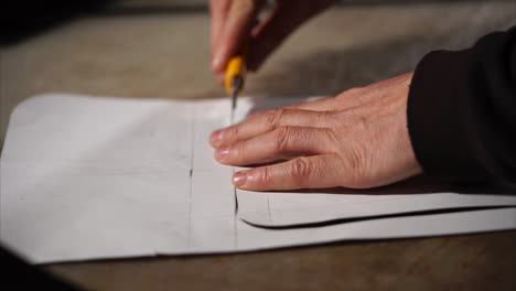 Cutting a pattern on paper