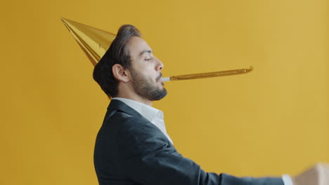 man in a suit celebrating a birthday