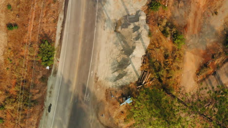 Bird's-eye-view-of-an-excavator-destroying-the-environment-in-a-construction-site