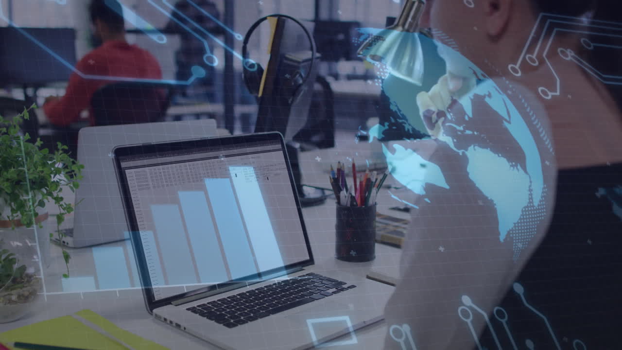 Analyzing data, business person using laptop with animation of digital world map