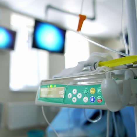 medical equipment necessary for surgical operations. close up. blurred background with working screens and monitors