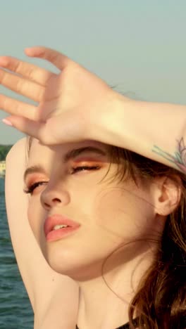 beautiful woman by the water