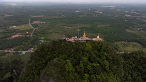 Golden-Buddha-statue-at-Tiger-Cave-Temple-Wat-Tham-Sua-in-Krabi-Thailand