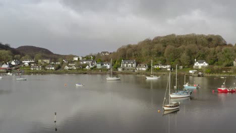 an aerial view of the harbour village of tayvallich on an overcast day in argyll and bute, scotland