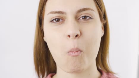 woman eating dried orange. dry fruits.