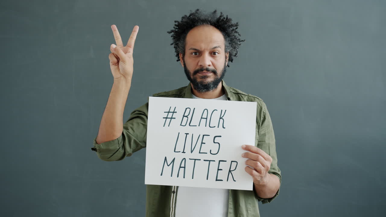 Man Holding Black Lives Matter Sign