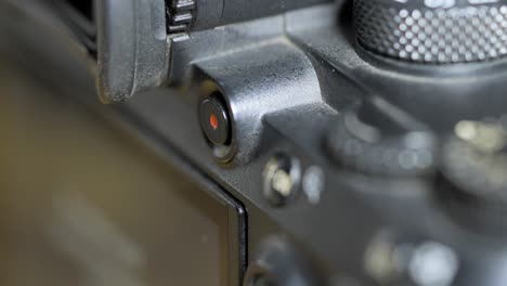 clicking-camera-rolling-button-closeup-view