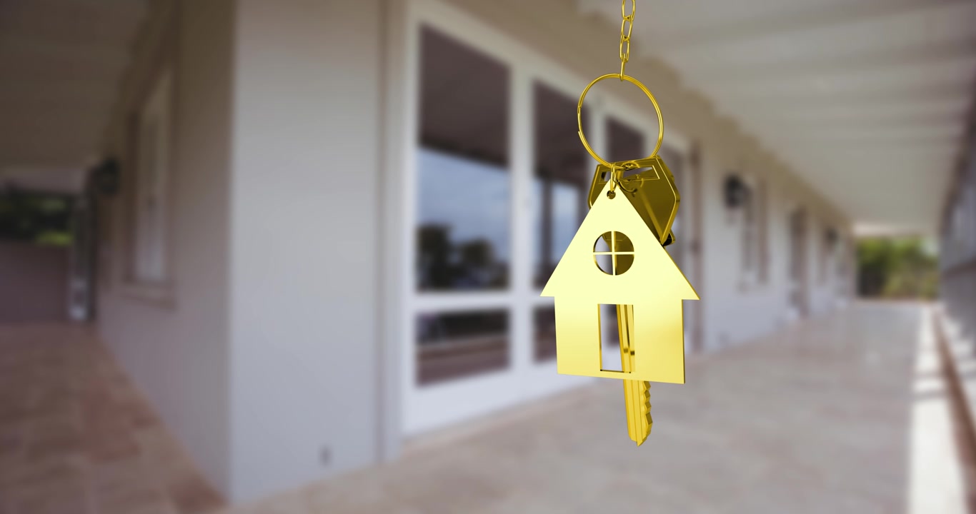 Animazione di una chiave dorata a forma di casa su una casa