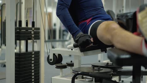 person performs an exercise to strengthen the muscles of the legs 3