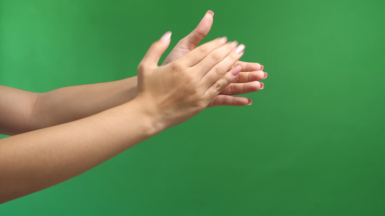 Woman Clapping Hands On Green Screen Background