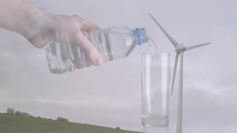 animation of caucasian woman pouring water into plastic bottle and wind turbine