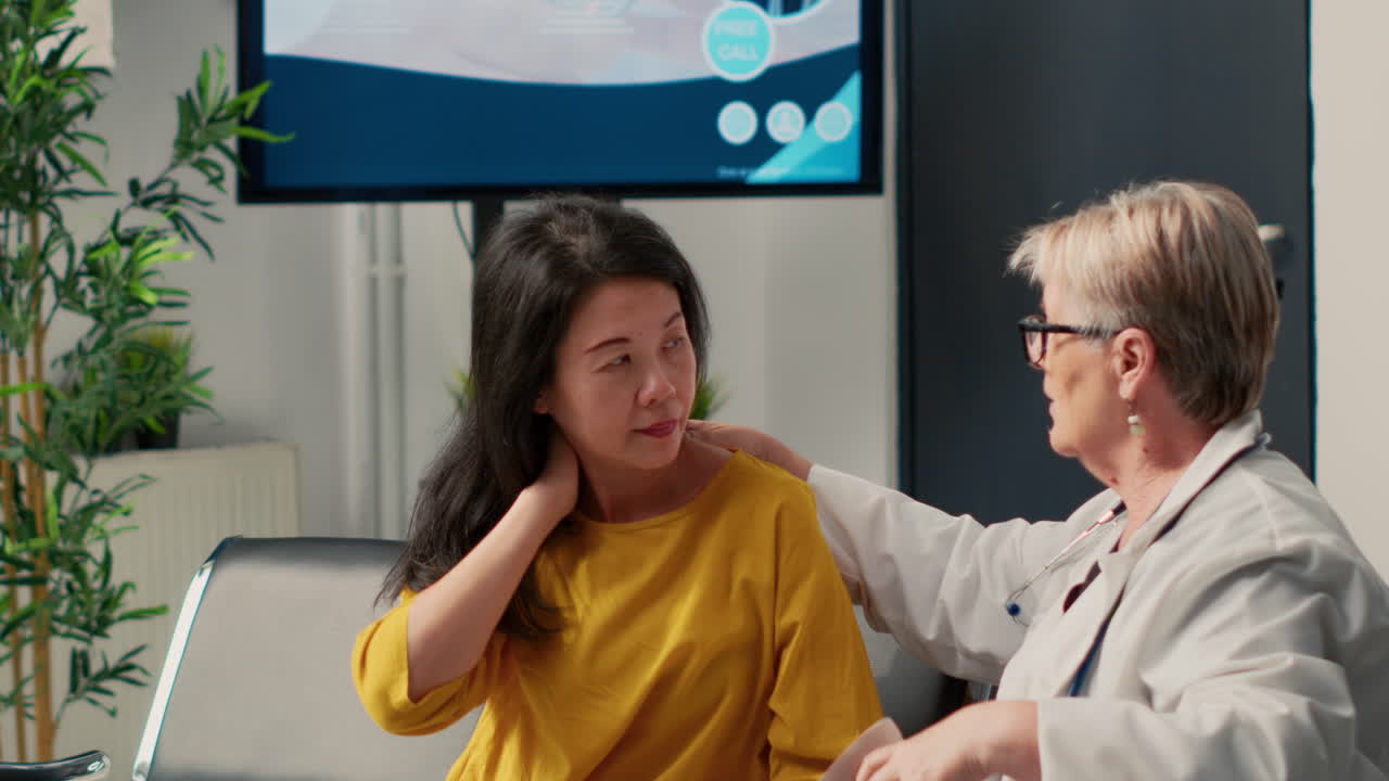 Medical professionals assisting a patient with a neck brace