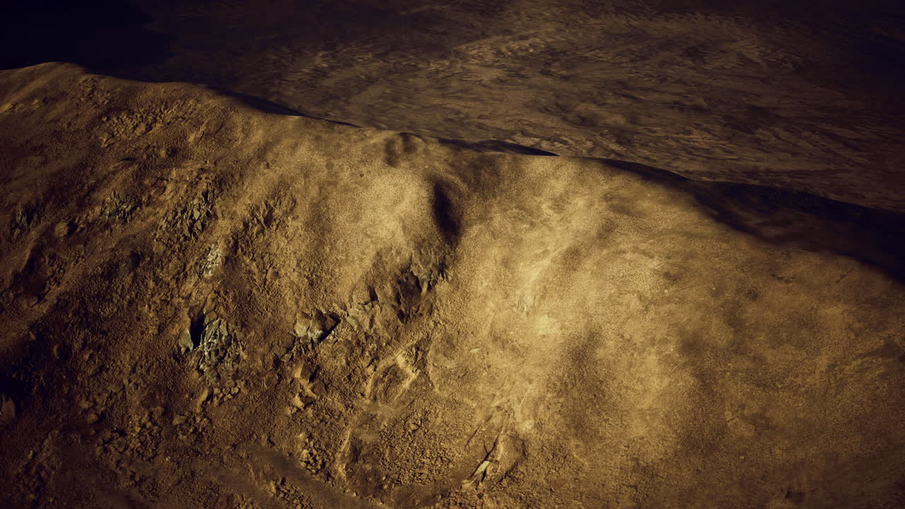 Exploring rocky terrain under a dramatic sky at dusk in a remote landscape