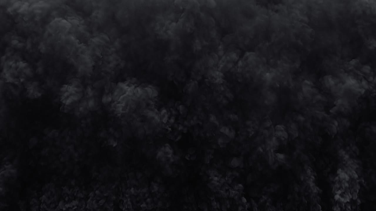 Nuvola di fumo nero denso in movimento ed espansione