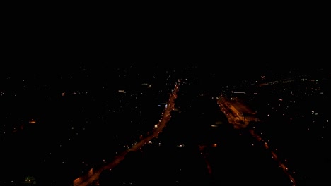 drone shot of the streets of goettingen at night, lower saxony, germany, europe