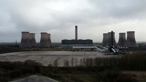 aerial view orbiting coal fired power station site, fiddlers ferry overcast smokestack skyline