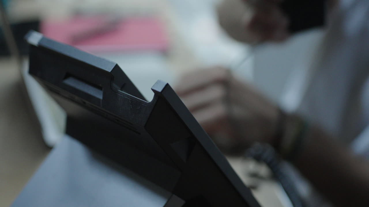 Close-up of a corded business phone