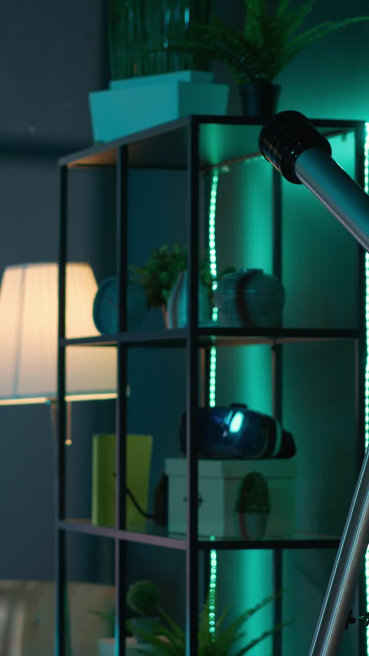 Telescope and VR Headset in a Dark Room with Green Ambient Lighting