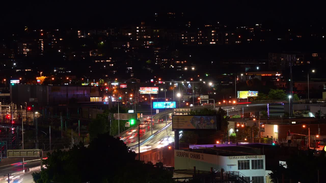 Night time-lapse shot capturing traffic on Brisbane inner city bypass.