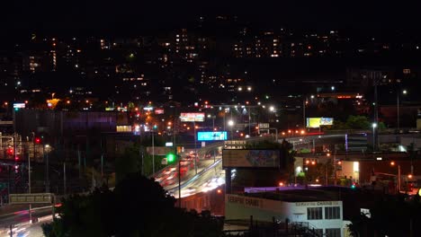 night time-lapse shot capturing traffic on brisbane inner city bypass.