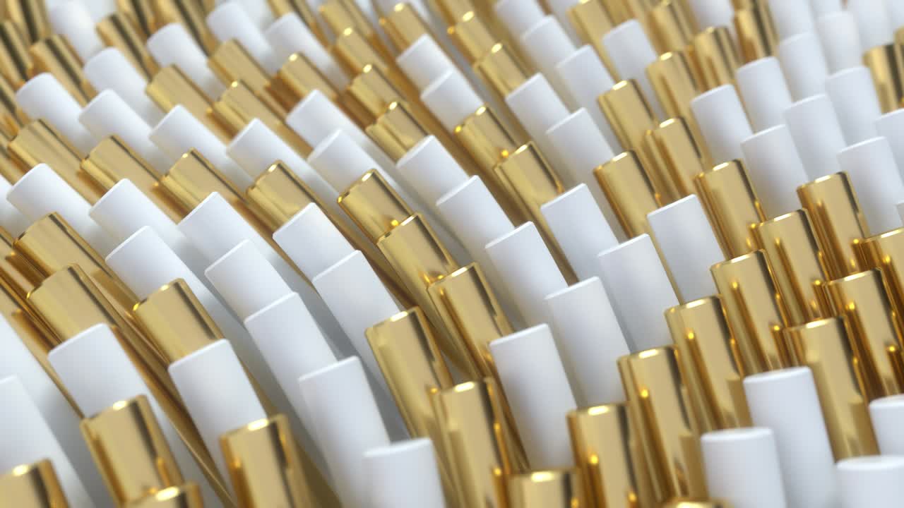 진동하는 색과 황금색 실린더