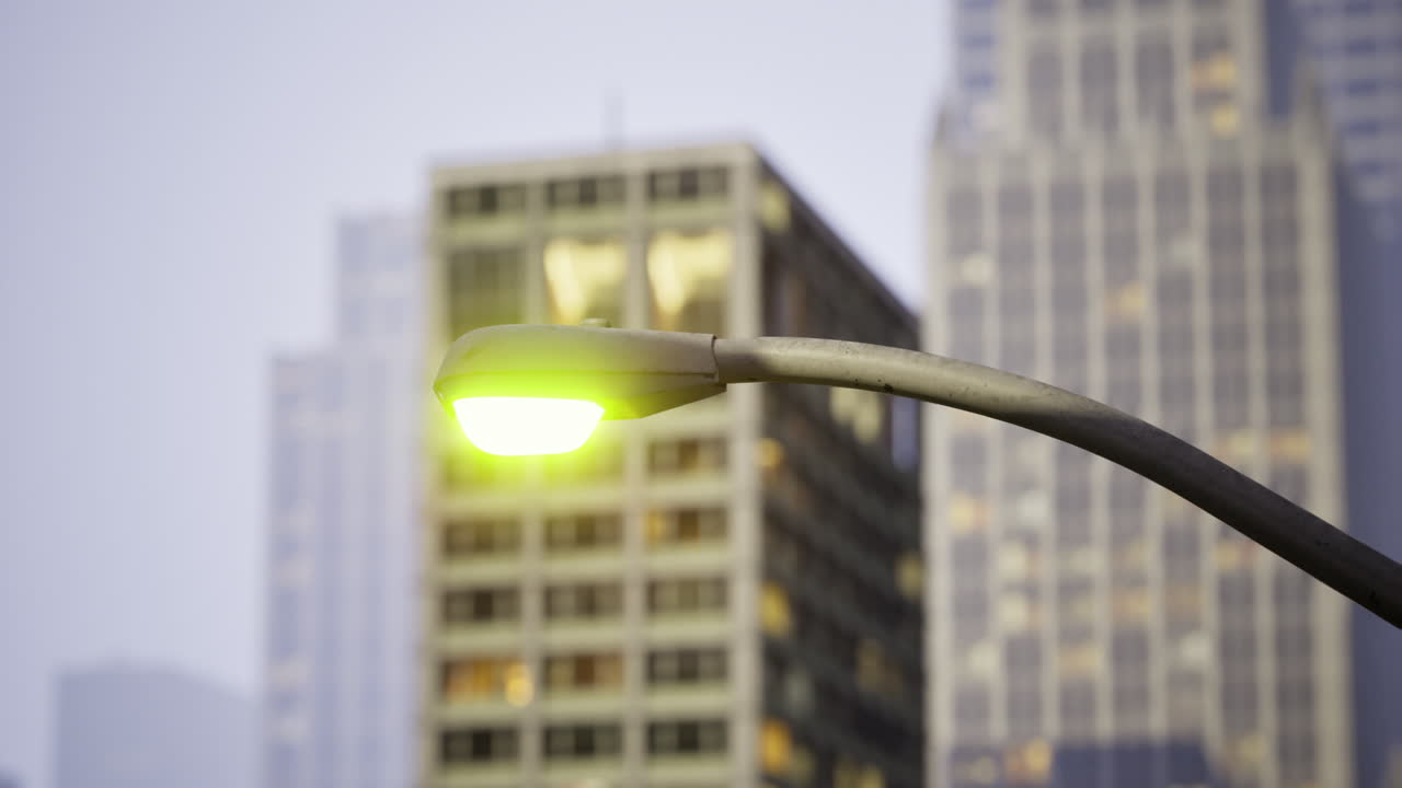 Urban glow illuminating modern architecture at twilight in the cityscape