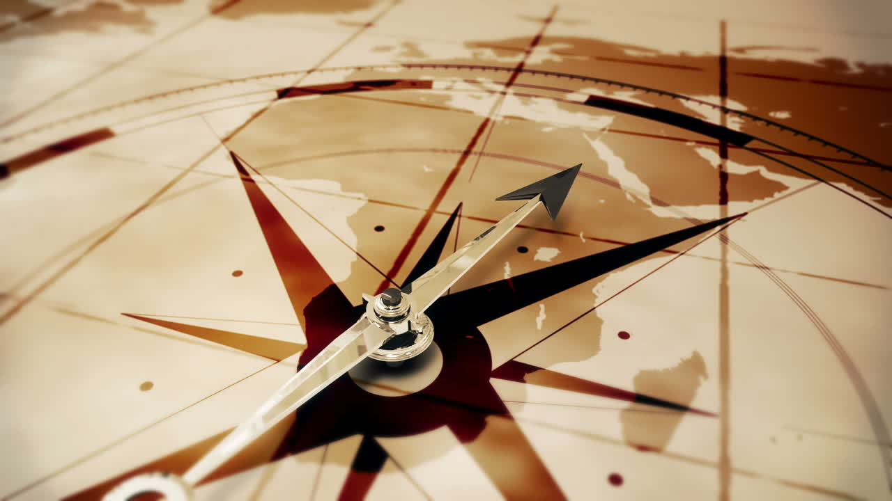 Compass pointing on an old map