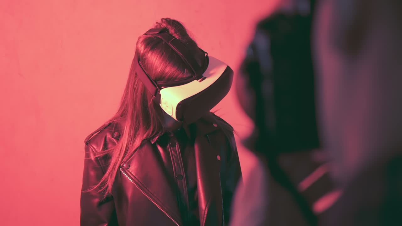 Model with a virtual reality head set is photographed