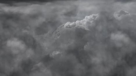 dark sky and gray cumulonimbus clouds ,thunderstorm in the dark sky