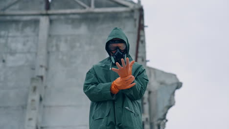 man in protective mask and safety hazmat. scientist working on quarantine in protective uniform.