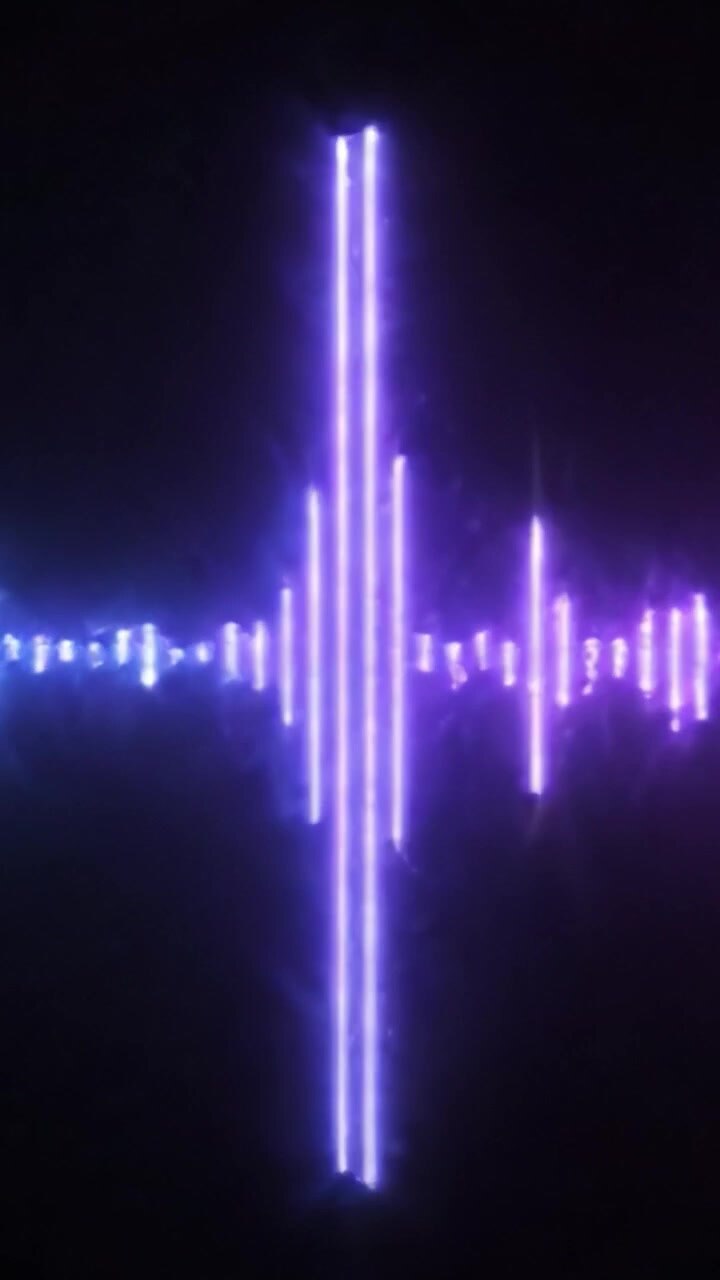 A Stunning Transition of Visual Waves: From Radiant Blue to Striking Pink, This Sequence Captures the Dynamic Shift in Light and Energy Flow Across a Dark Background.