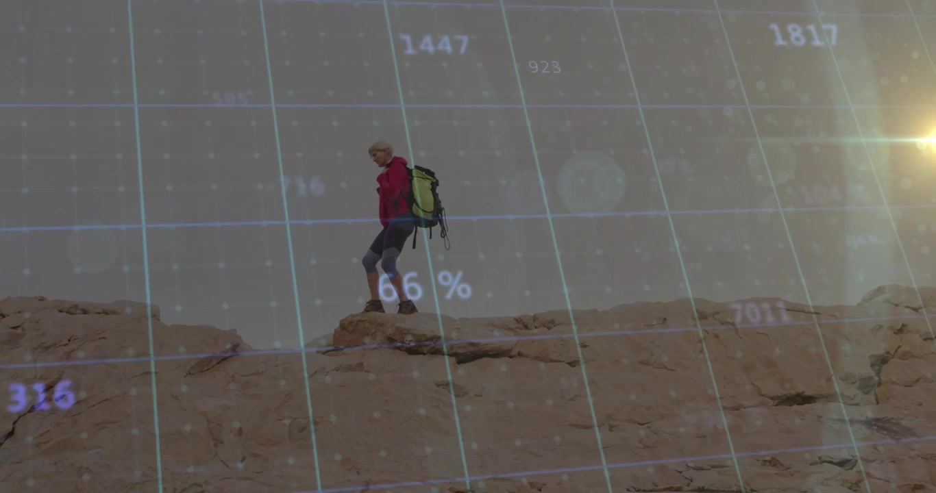 Hiker traversing desert sandstone ridge, showcasing tech with grid overlay and numeric data