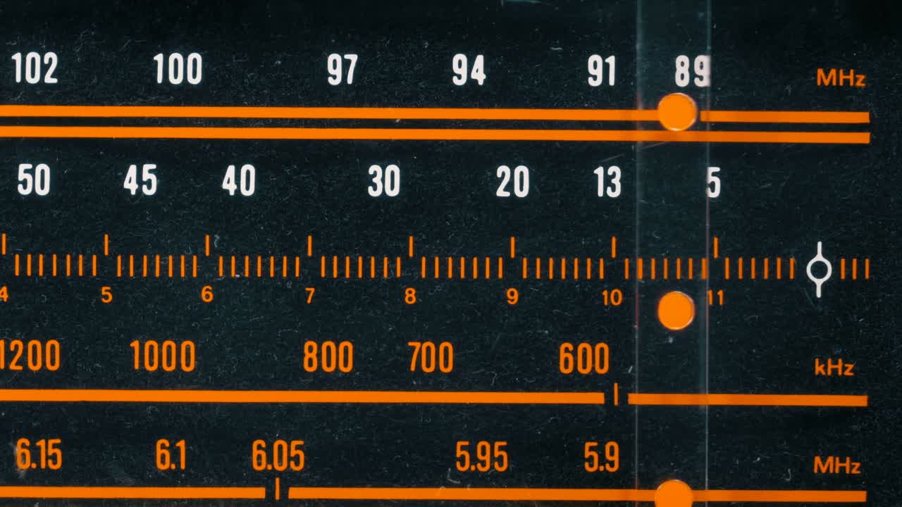 Tuning Analog Radio Dial Frequency on Scale of the Vintage Receiver
