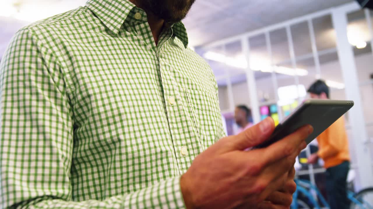 Business executive using digital tablet