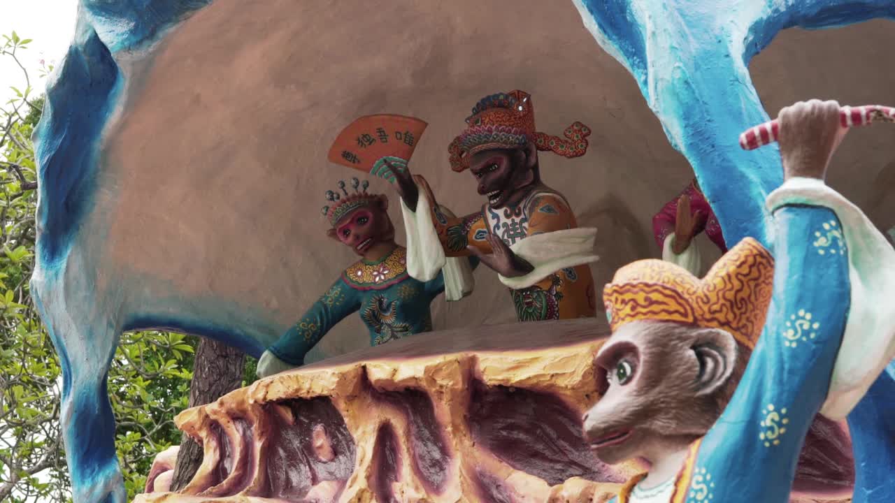 Colorful Statues of Monkeys in a Cave